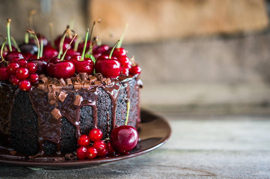 Chocolate Cake with Cherries on Top.