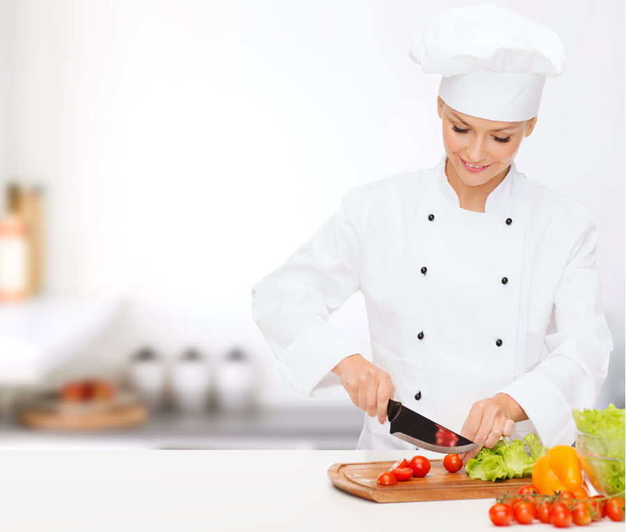 Executive Chef Cutting Vegetables.