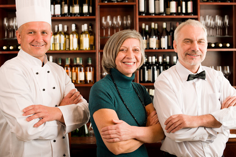 Restaurant Manager With Staff.